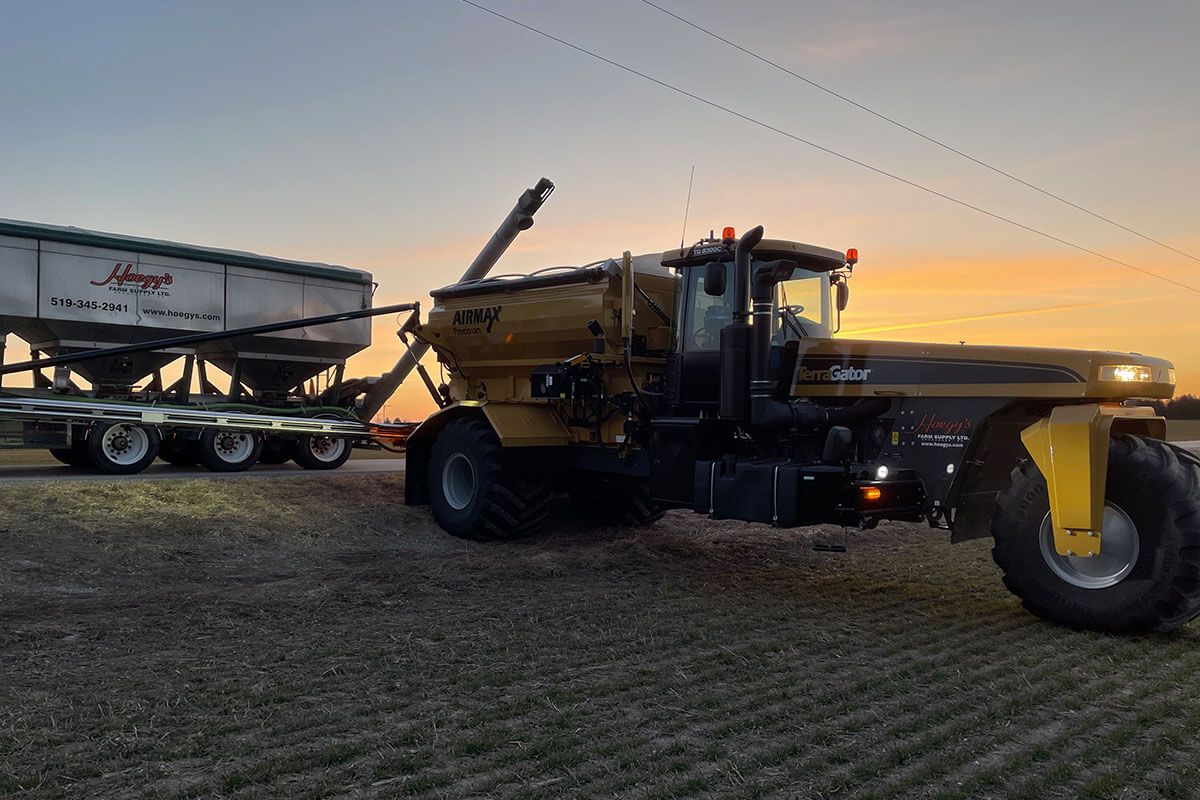 Terragator being loaded in the field at sunset in Huron County