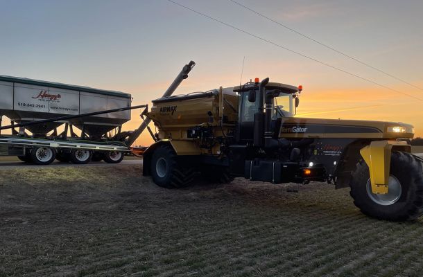 Terragator being loaded in the field at sunset in Huron County